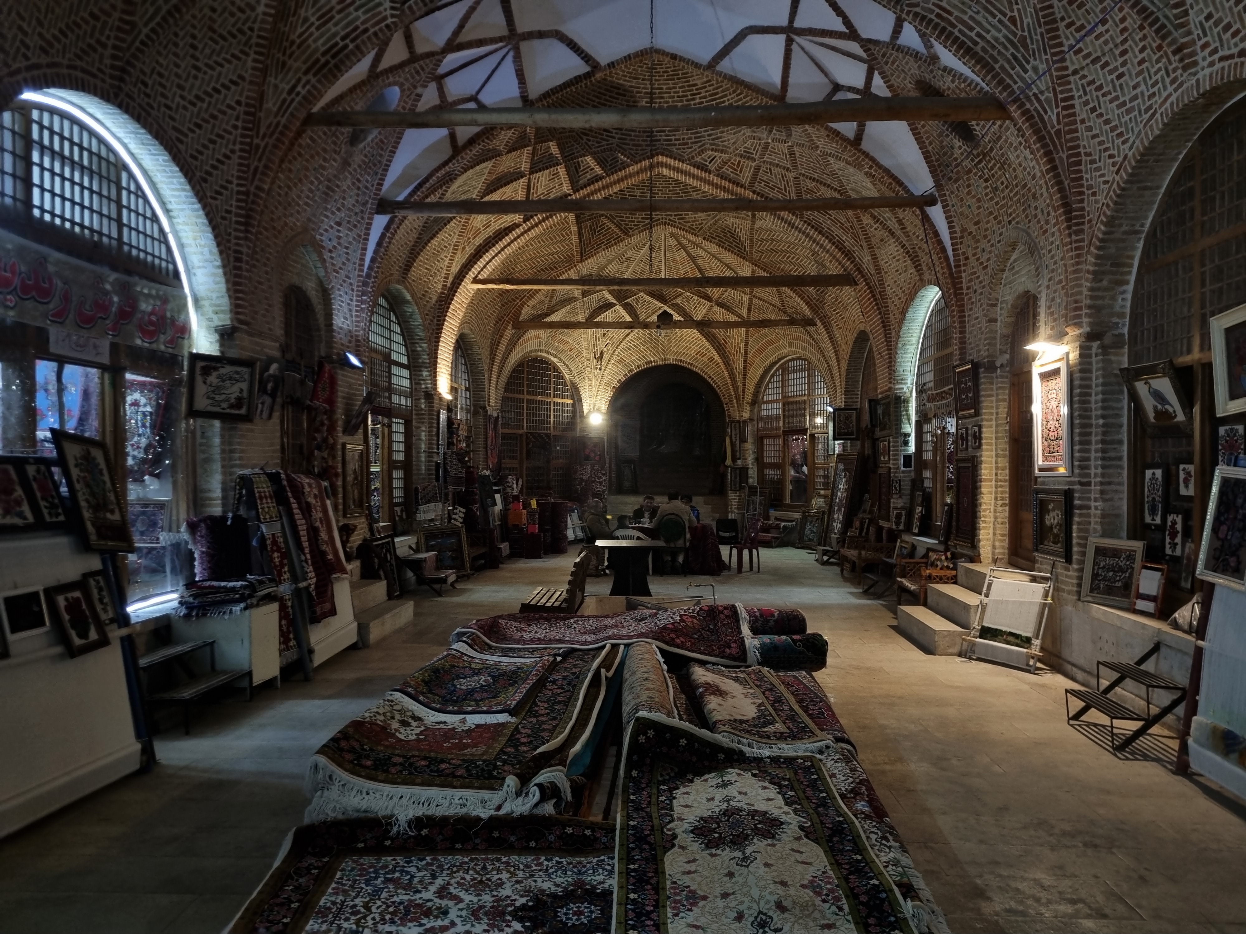Carpets beneath the brick vaults of Bijar’s old bazaar, 26 February 2025.