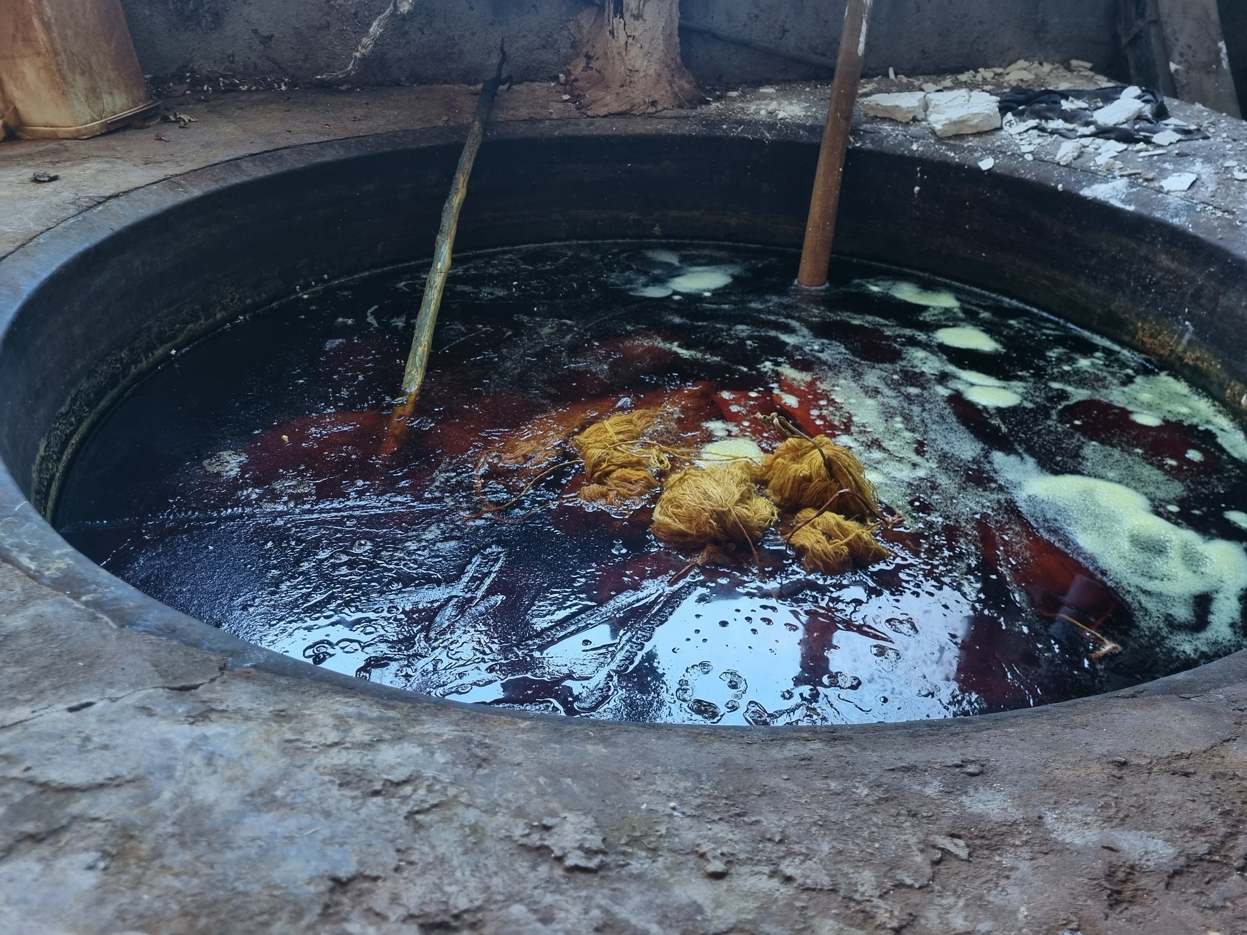 Bijar dye workshop: yarn in a dye vat, 27 February 2025.