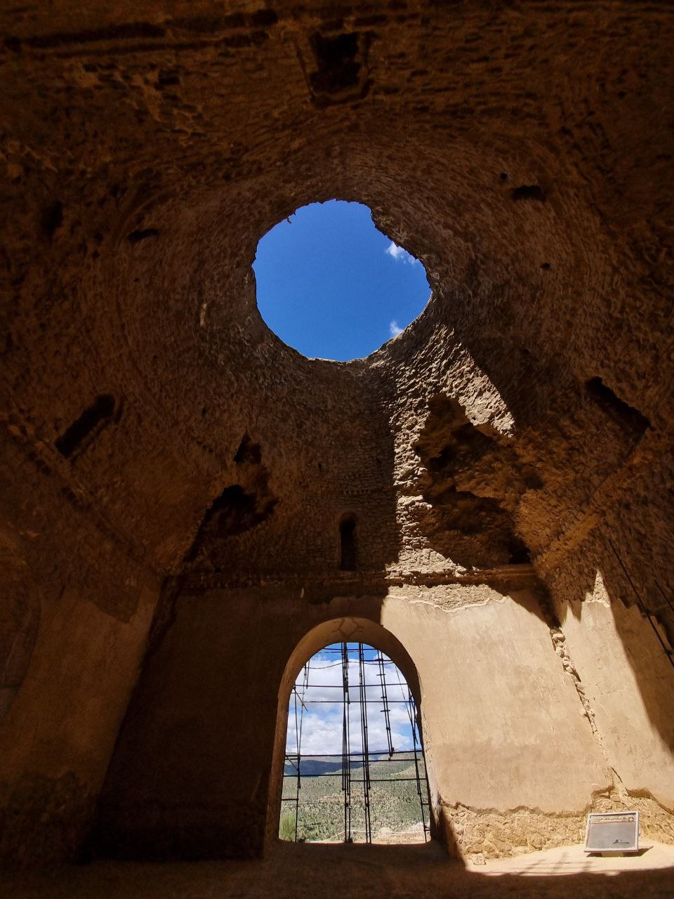 Qal‘eh Dokhtar — the broken dome opens to the sky.