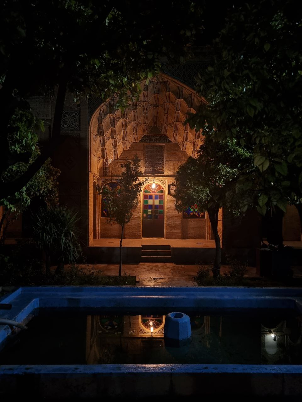 Hafezieh — the tomb pavilion illuminated at night.