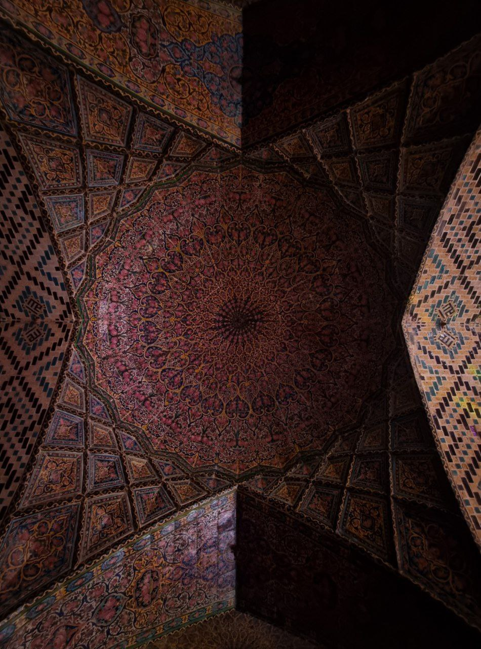 Nasir al-Mulk Mosque — the patterned ceiling seen from below.