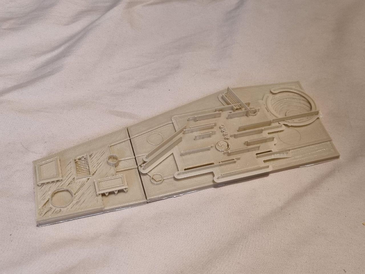 Photograph of the original physical Oasis model showing the long site and roof geometry
