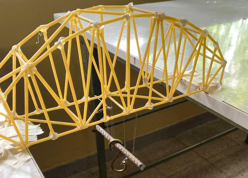 Close view of the truss members, joints and suspended load connection