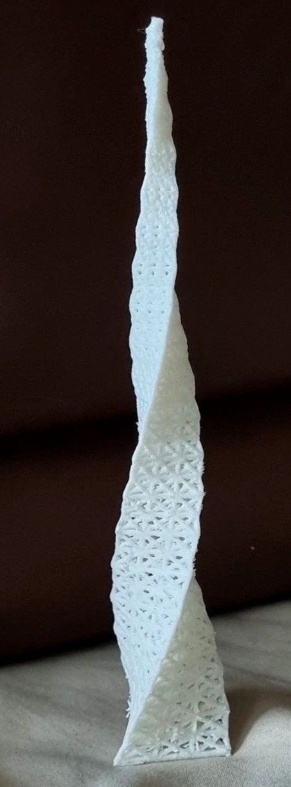 Physical white printed model of the twisting lattice tower